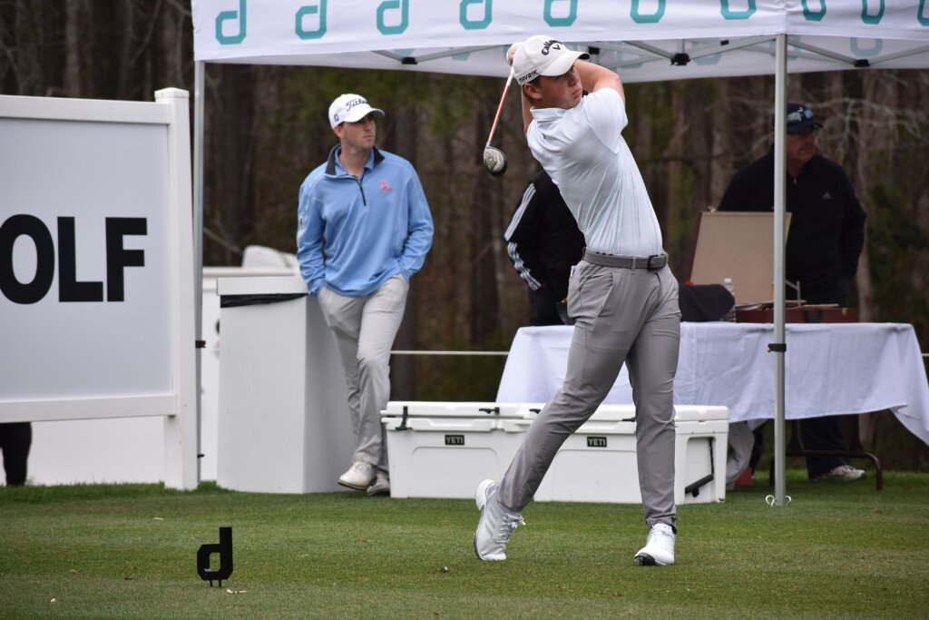 Players near the top of the leaderboard discuss their rounds on Saturday